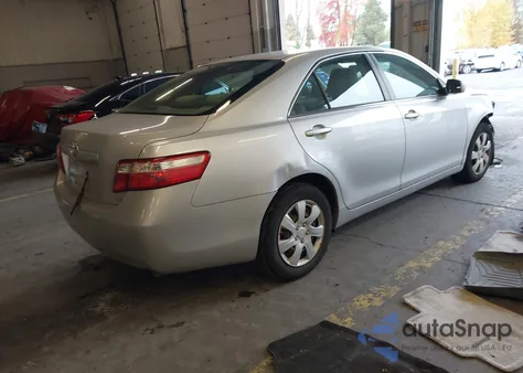 2009 Toyota Camry Le z USA, uszkodzony, nr VIN JTNBE46KX93188883